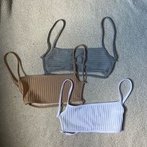 three PLT open back crop tops